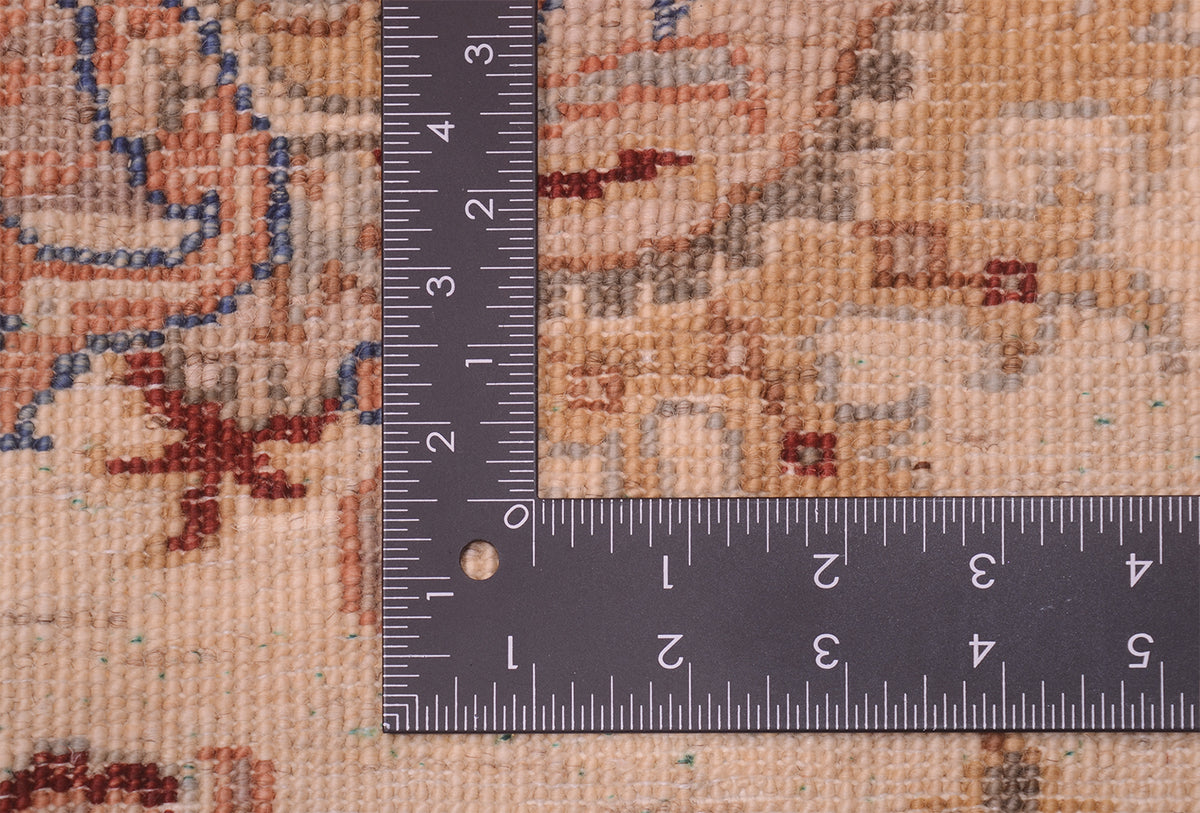 Detail of back of handmade rug showing quality wool knots and fineness of weave.