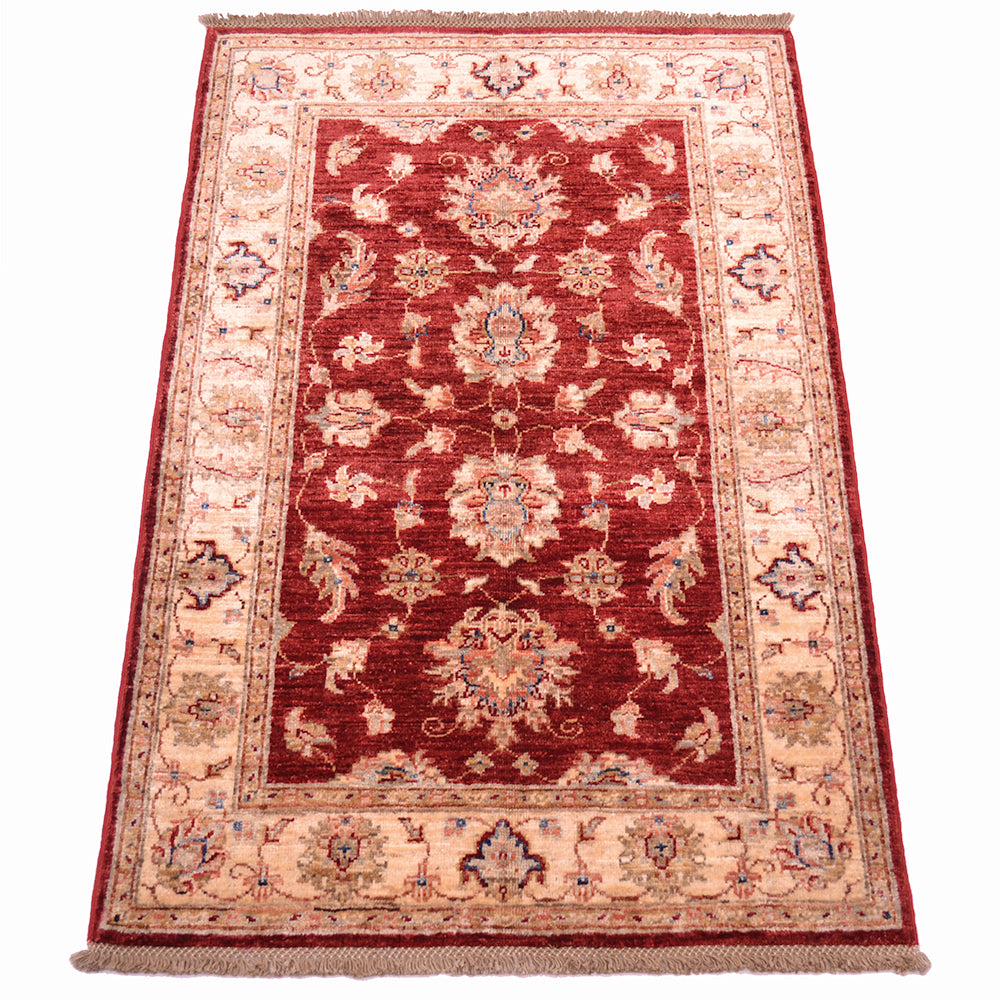All over traditional floral design in rich reds and ivory creams woven on a cotton foundation.