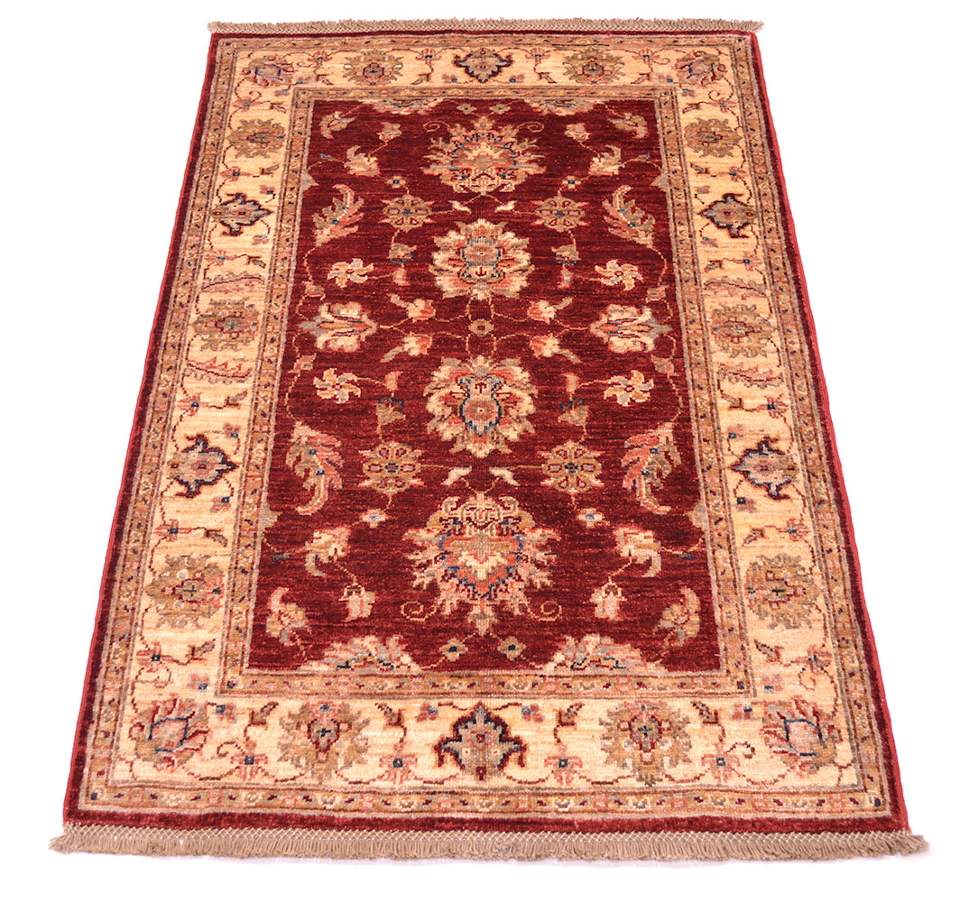 Versatile sized handknotted afghan ziegler rug with highly floral composition.