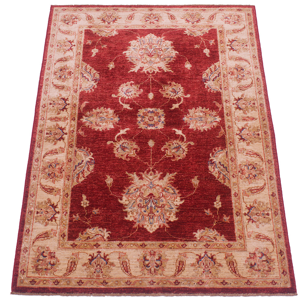 Large palmettes in field of Afghan Ziegler design rug in red and gold- beige.