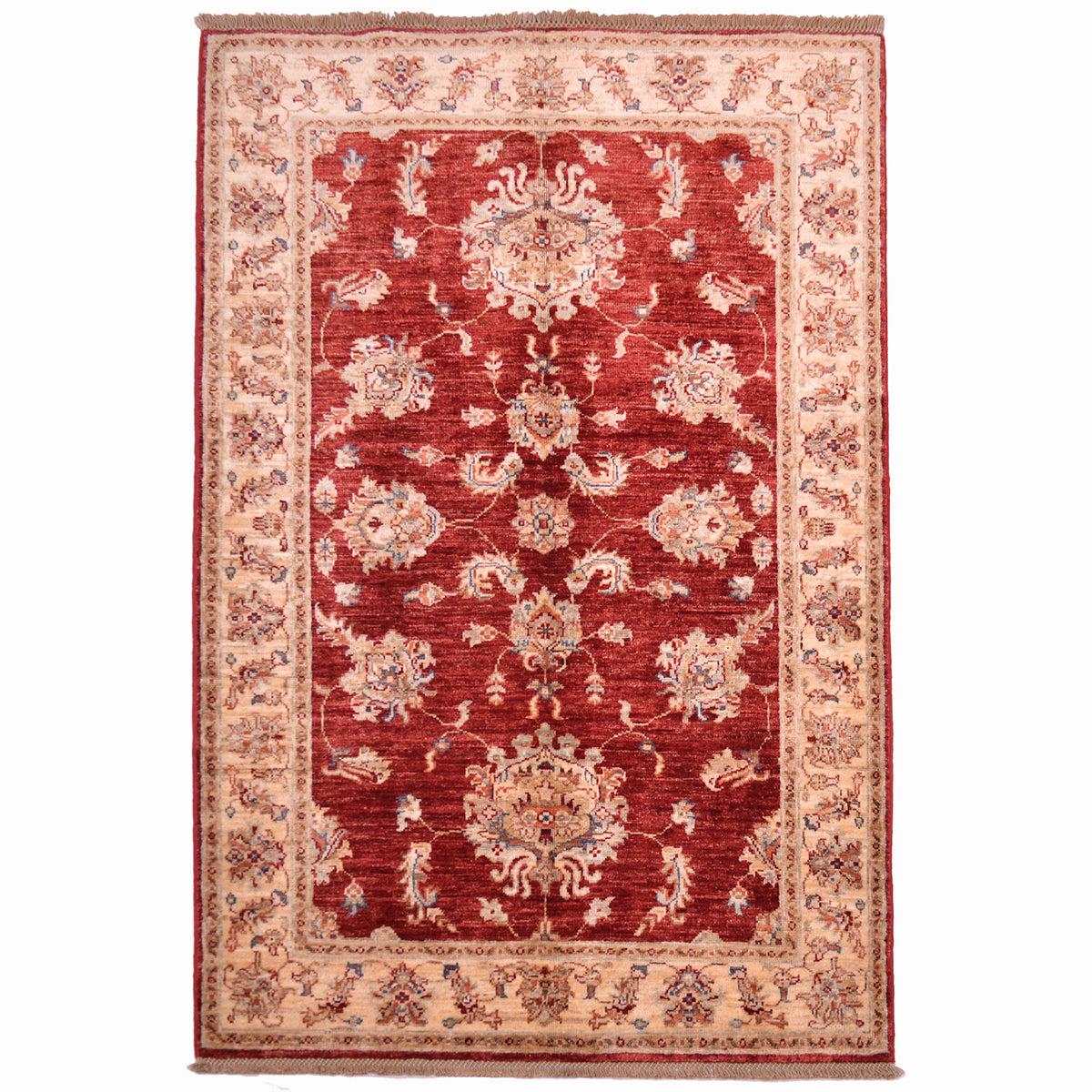 Floral design Afghan Ziegler rug in russet red with gold and cream border.