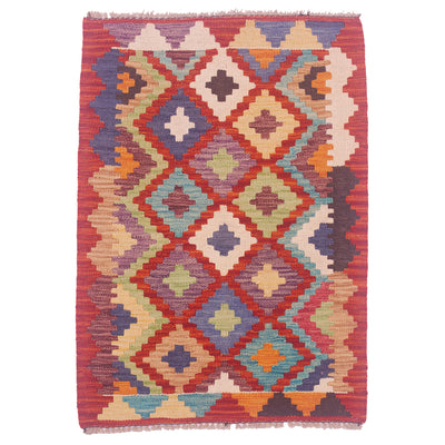 Handwoven kilim rug with red, cream, blue and multicolor diamond geometric motif