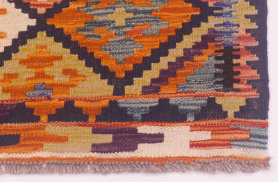 Corner of Afghan kilim showing the woollen fringes 
