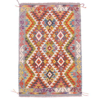 Handwoven Kelim rug with multicolour geometric design & turquoise-blue border.