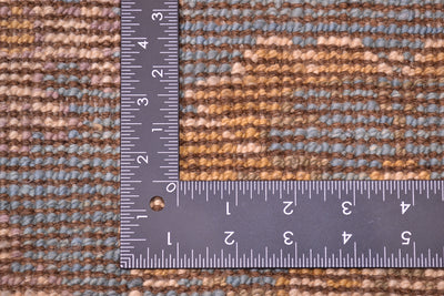 Detail of reverse of carpet showing handknotting and wefts. Pure wool pile.
