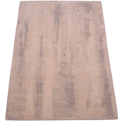 Fluid abstract modern design of  Handknotted Indian Carpet in smoky tonal neturals of grey, cream and beige, and subtle blurring of tonalities.