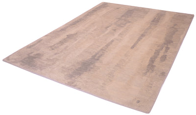 Angel view of abstract modern carpet with restrained palette of beige, greys and ivory creams with softened design.