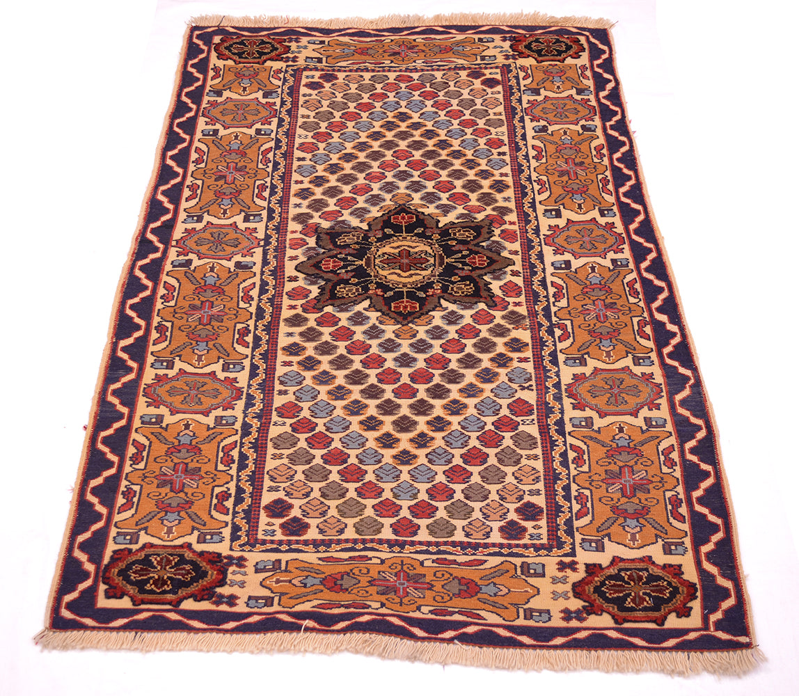 A traditional rectangular Afghan Barjasta Kilim rug with a complex geometric and floral pattern, featuring a central medallion, detailed borders, and fringed edges on a white background.