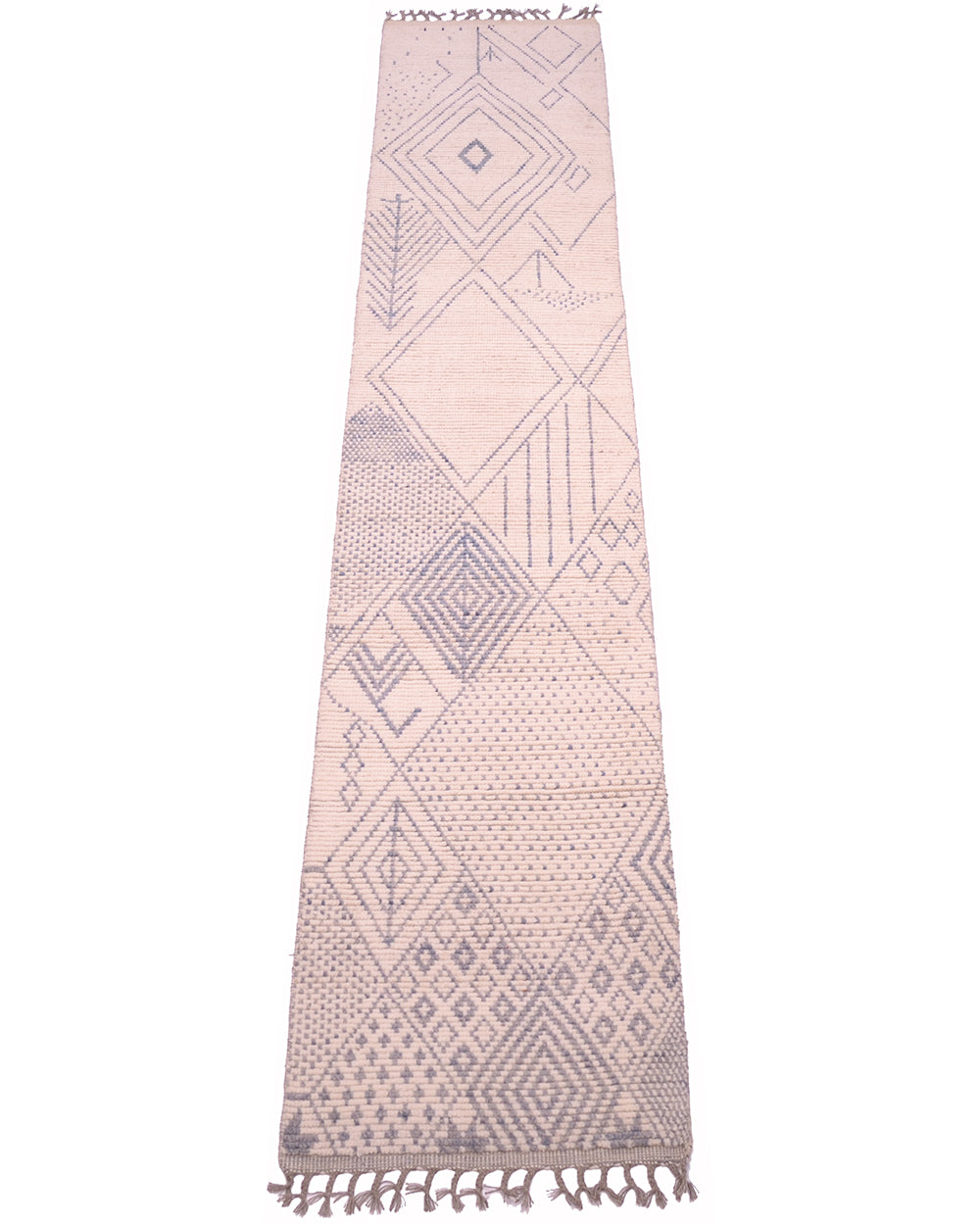 A long, narrow woven Afghan Berber runner rug with a geometric pattern in muted grey-blue on a off-white background, finished with fringe tassels on both ends.