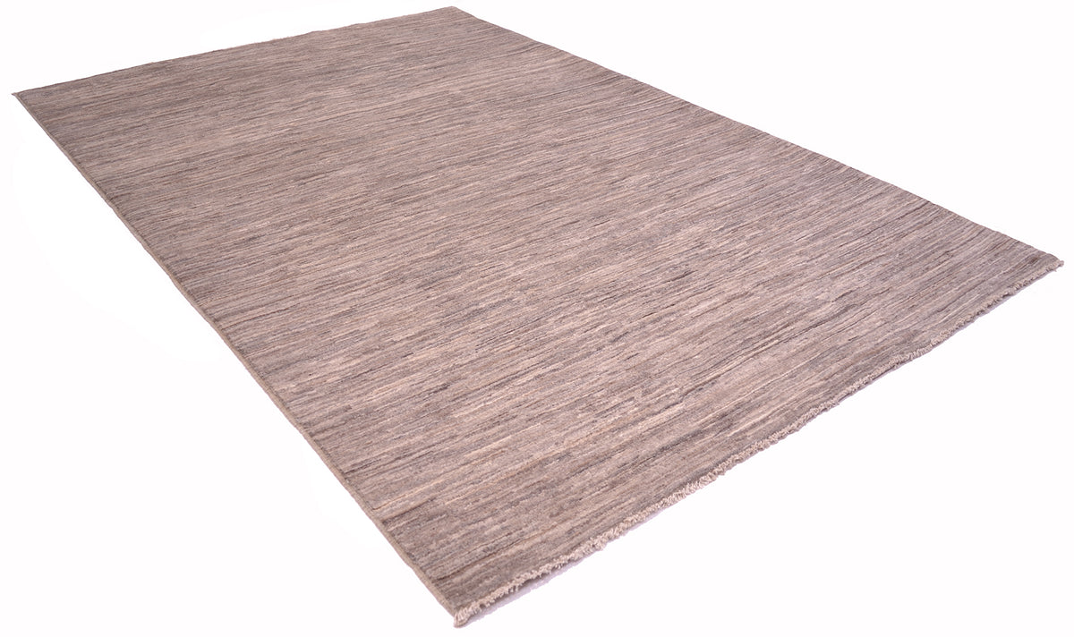 A rectangular plain Gabbeh rug with a textured, woven surface in a muted taupe-brown color, shown at an angle on a plain white background.