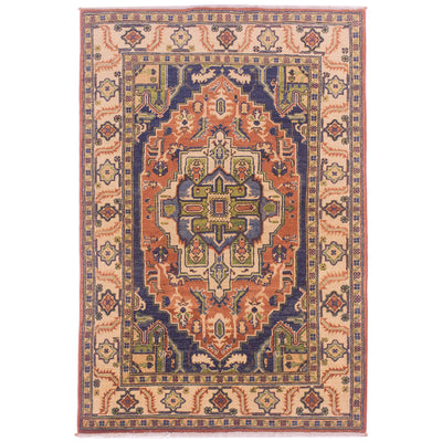 Geometric pattern hand-knotted wool pile Afghan Heriz design handmade rug in colours of terracotta, cream, green and blue.