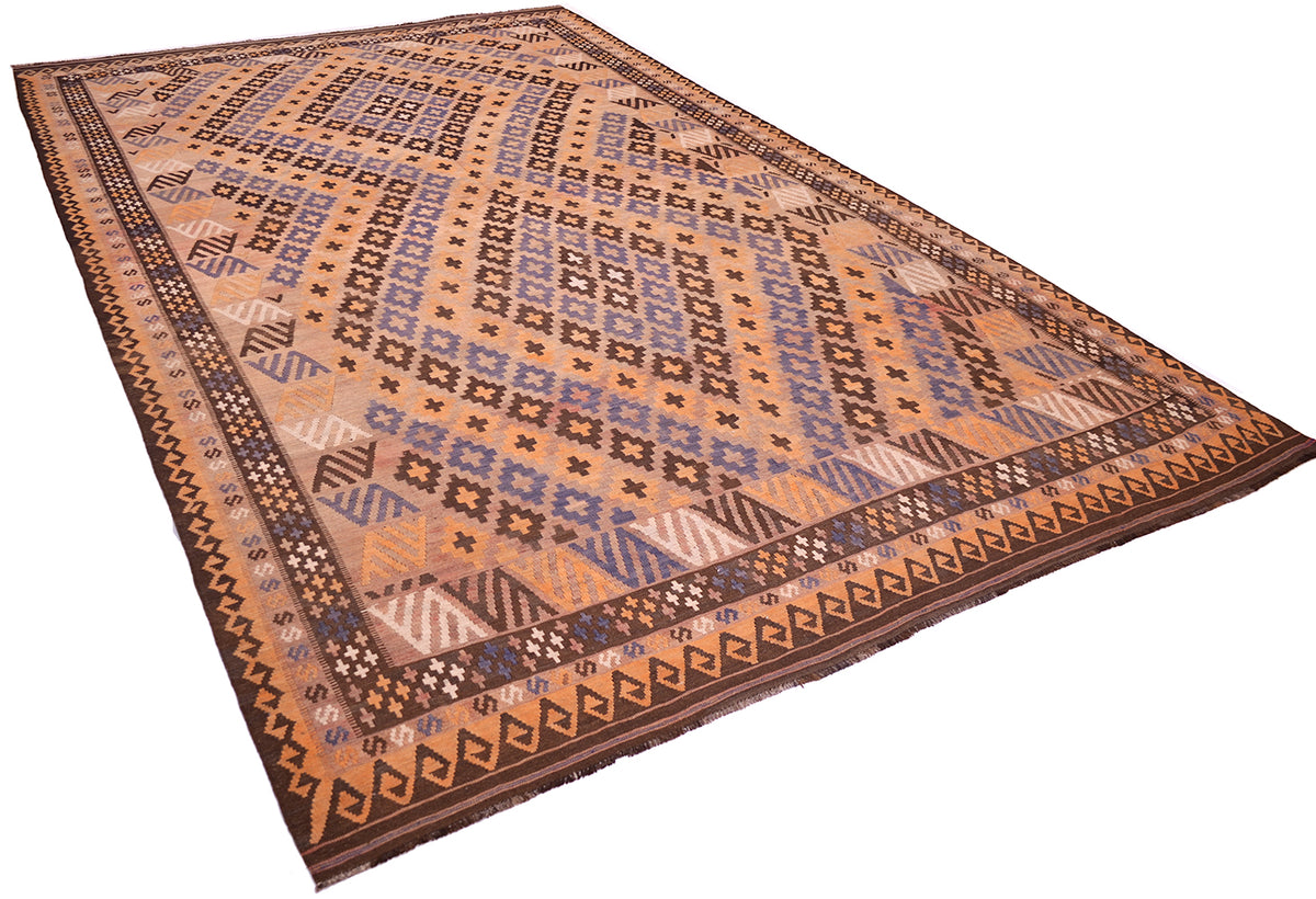 A 4x2.5m old kilim area rug with a geometric tribal pattern in shades of terracotta orange, brown, beige, and muted blue, shown on a plain white background.