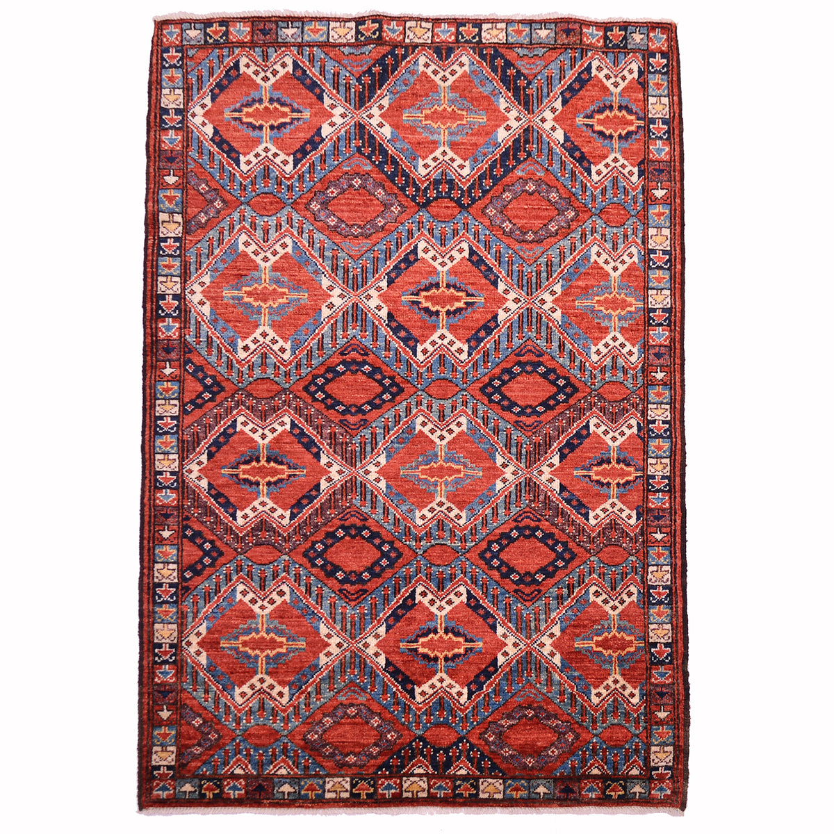Fine antique style Beshir rug with all over design in colours of rust, blue , yellow and cream.