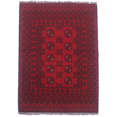 Hand-knotted wool pile red Afghan rug with 10 Bokhara gul design.