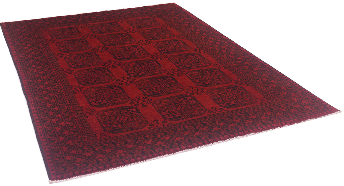 A rich red and black geometric design hand-knotted Afghan Fil Pai carpet with field theme of octagonal motifs on a white background. 