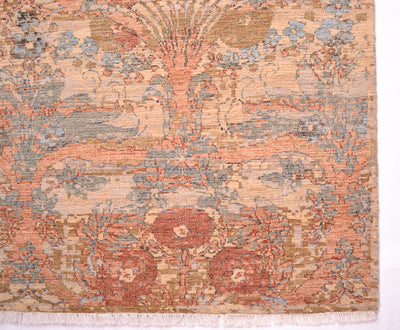 Corner detail of arts and craft flourishing carpet with interconnecting floral sprays, leaves and blossoms. Light blue and sea green secondary colours with gold and terracottas.
