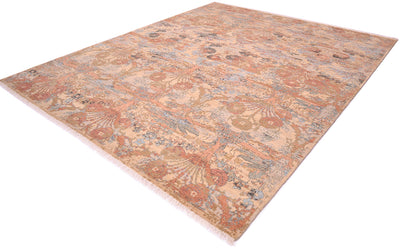 Angled view of soft coloured carpet with floral bouquet motifs with terracottas, light blue, greys and golds. Nuanced tones with softened detailing. Floral sprays all over floral design.