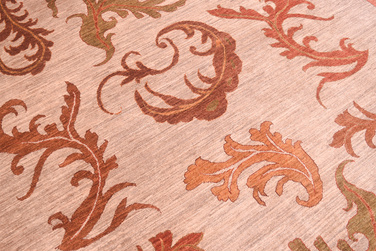 Detailed view and close up of  main field of large curvilinear handmade Afghan carpet with multidirectional  curling leaf motifs.