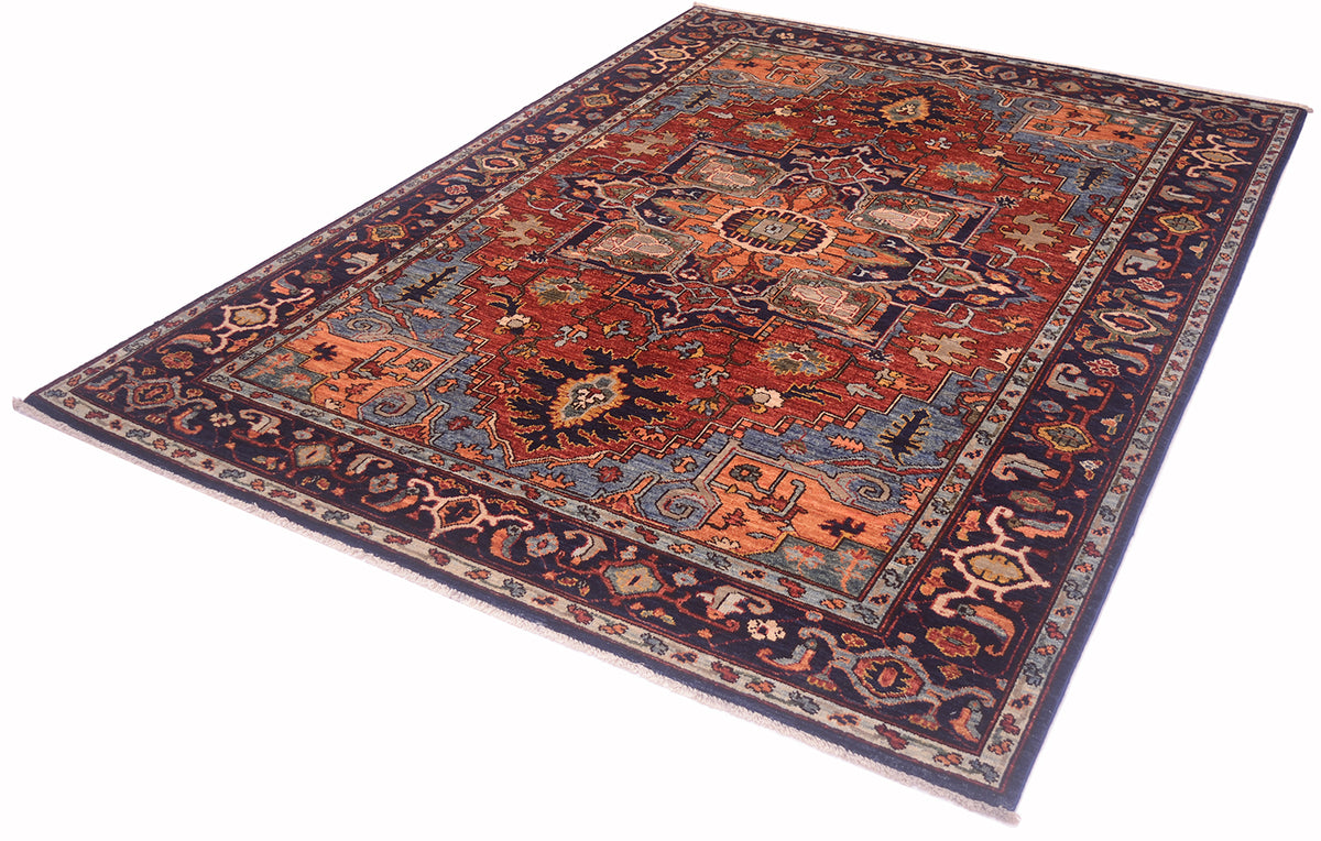 Heriz-style rug with red, blue and orange geometric pattern, flat woven surface
