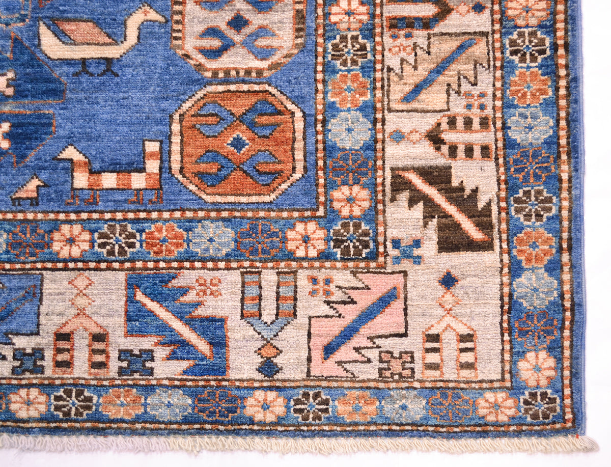 Handmade blue Afghan Shirvan design rug