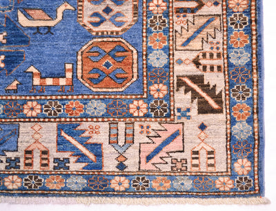 Handmade blue Afghan Shirvan design rug