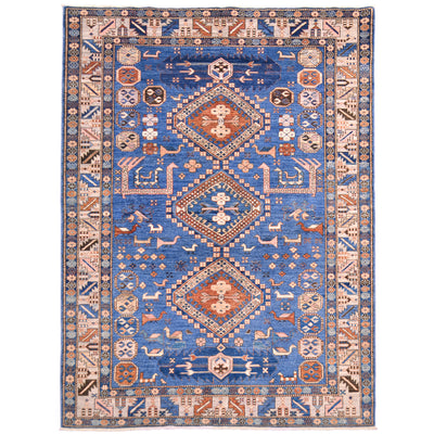 Blue hand-knotted wool pile Afghan Shirvan design rug with geometric medallion design.