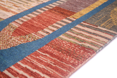 Close up detail of neattl bounds sides of fine afghan aryana carpet with modern abstract design. Natural vegetable dyes and handspun wool. Striped areas of design.