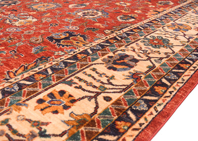 Handknotted Sultanabad design carpet corner, red field with cream and navy patterned trim