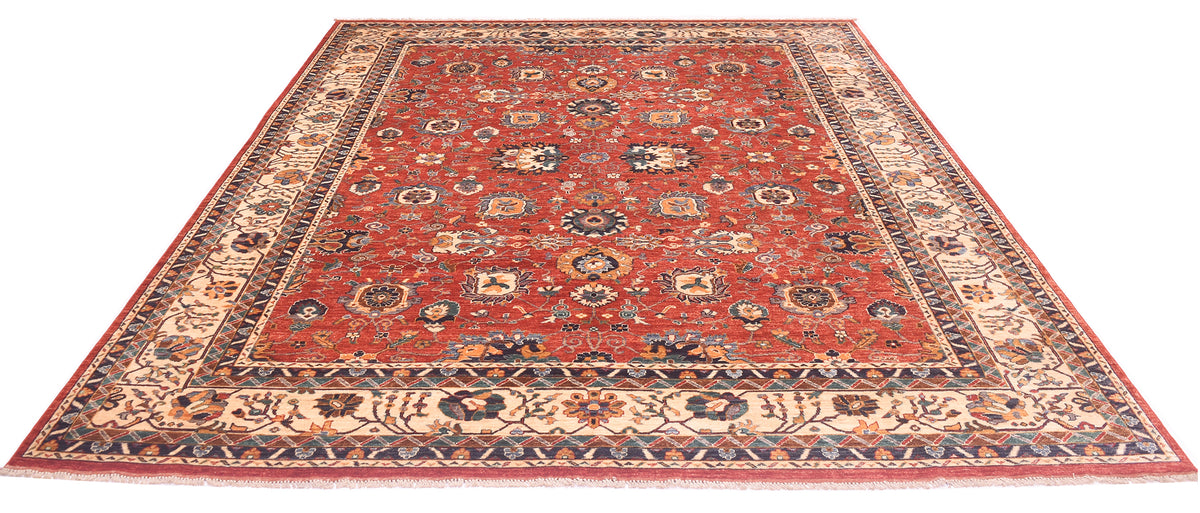 Handknotted Sultanabad design carpet, red center with medallion and cream framed border