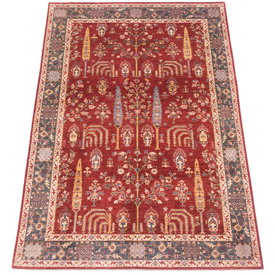 A traditional Pictorial fine Aryana Carpet with a deep red field, featuring a central tree motifs and ornate floral patterns in beige, blue, and gold, surrounded by a detailed green border.