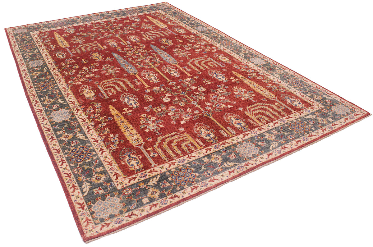 A traditional oriental-style fine Afghan Aryana area rug with a deep red field, detailed floral and architectural motifs, and a wide beige and green border, shown from an elevated angle on a white background.
