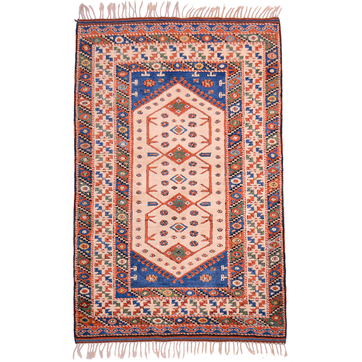 Old Turkish rug, cream with geometric design with detail colours in blue, orange/rust, and green.