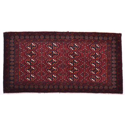A rectangular traditional Maroon Afghan Belouch mat with a deep field, featuring a repeating geometric medallion pattern in black, beige, and white, surrounded by a dark border.