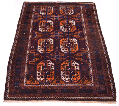 A traditional Oriental-style old tribal Baluchi wool rug with a dark brown field, featuring geometric motifs in rust orange, beige, and brown, finished with a patterned border and fringed edges.