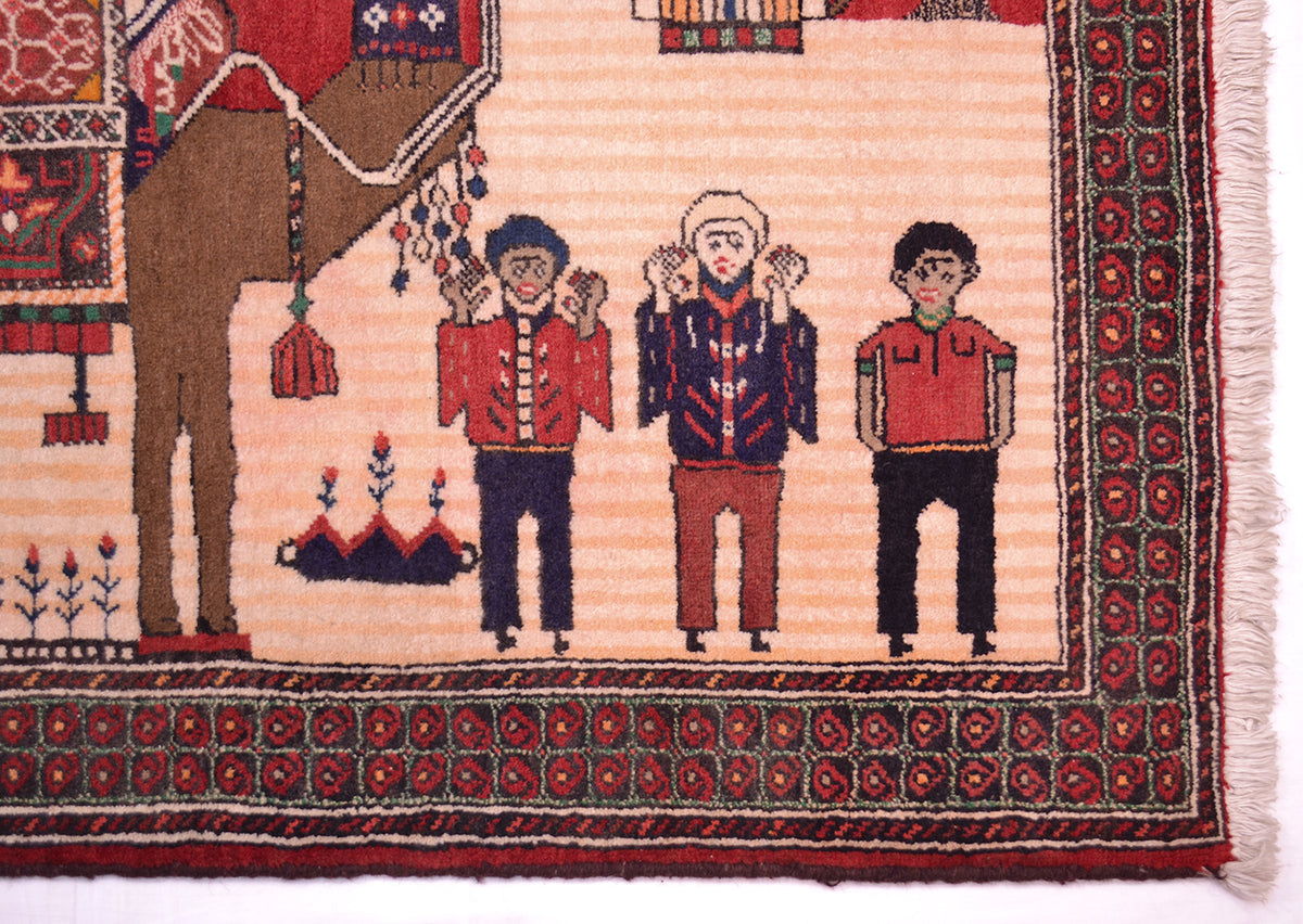 Close-up of a woven Pictorial Afghan Belouch rug showing a cream field with a brown camel, three stylised human figures in red and dark blue garments, and a red patterned border with fringe.