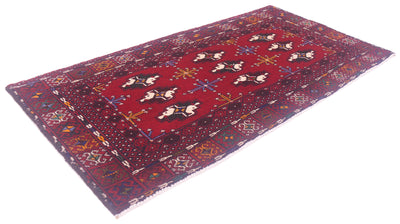 A rectangular traditional red Afghan Belouch small rug or mat with a deep red field, geometric borders, and cream, blue, and black motifs, shown on a plain white background.