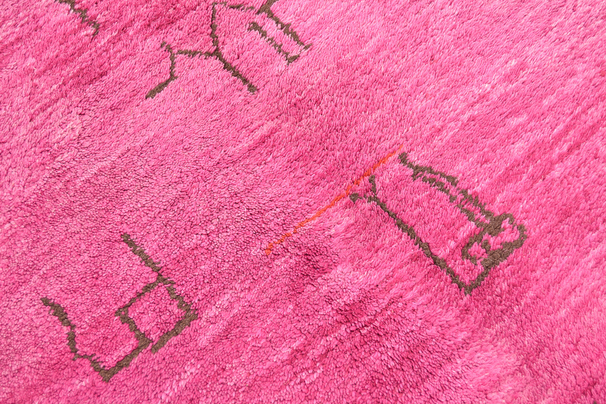 Purple Moroccan Berber Beni Mrirt Carpet with ancient tribal symbols. Handmade, wool pile hand-knotted onto wool.