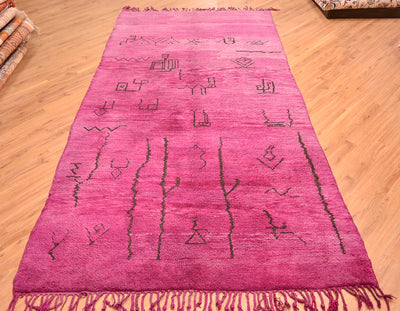 Purple Moroccan Berber Beni Mrirt Carpet with ancient tribal symbols. Handmade, wool pile hand-knotted onto wool.