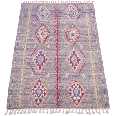 A rectangular Afghan woven Berber style rug with a grey base and geometric tribal patterns in red, pink, yellow, and blue, finished with cream fringe on the top and bottom.