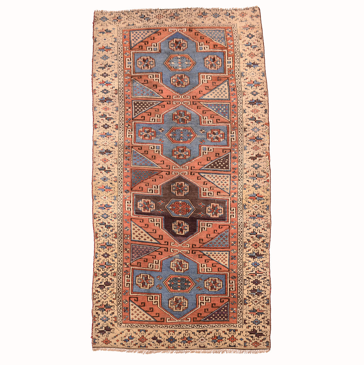 Antique Bergama rug with 4 medallion design on a terracotta background surrounded by a beige main border.