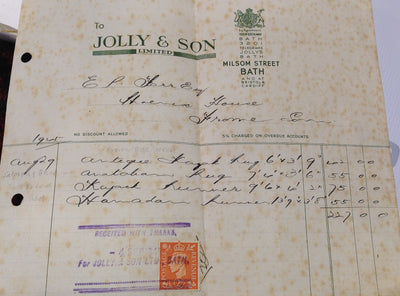 Vintage receipt paper marked “Jolly & Son Limited” with handwritten notes