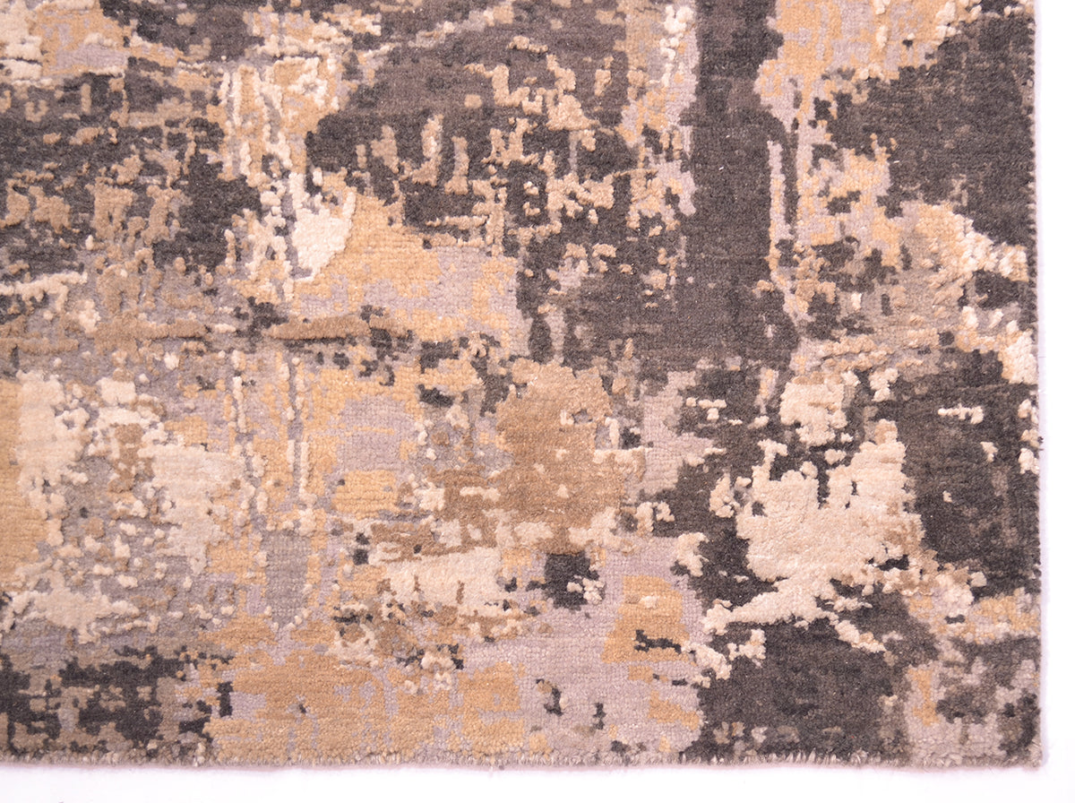 Detailed corner, with bound fringes and no fringes.......all over abstract design in neutral colours!