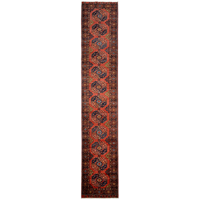 Hand-knotted long Afghan Ersari Runner with elephants foot design on a terracotta / rust ground.