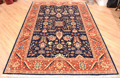 Fine handmade Ferahn design carpet handknotted in Pakistan with all over tradittonal floral classic design ...hints of midnight blue, golden ivory cream, light green, sea blue as well as a rust-amber background colour to border. 