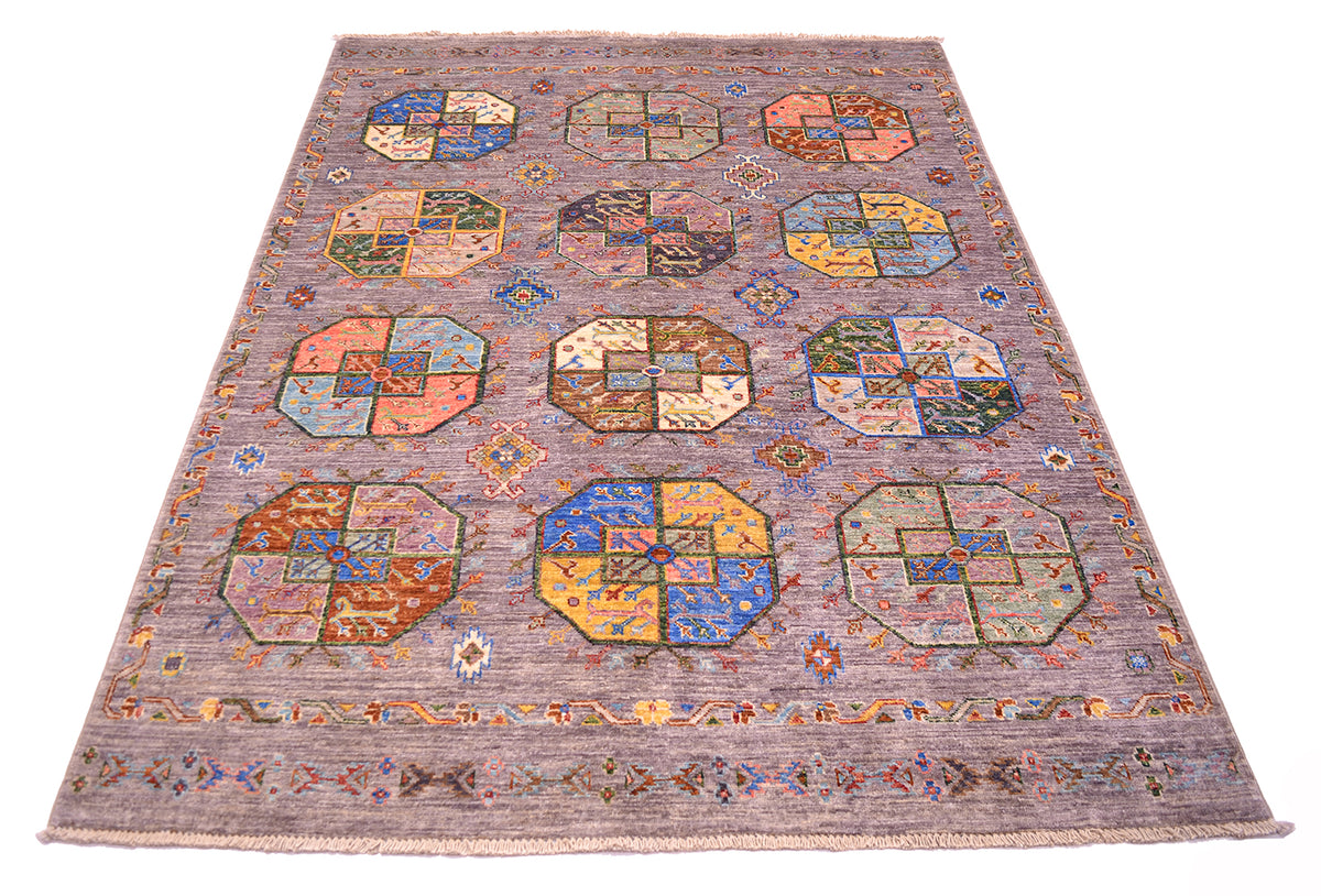 A square hand-woven Afghan modern Fil Pai area rug with a muted grey field, featuring a repeating pattern of multicoloured octagonal medallions and a detailed border.