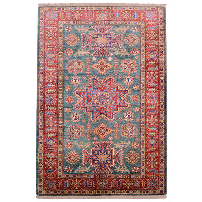 Green handmade fine Kazak Rug with green ground and red border and Lesghi star medallion.