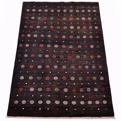 A dark brown-black rectangular 5x3 Afghan Gabbeh rug with a woven texture, decorated with rows of small geometric medallions and dots in red, blue, beige, and white, finished with a fringed edge
