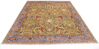 Overall view of magnifient  classic design garous style carpet in soft green and blue border. Handmade with botanical designs.