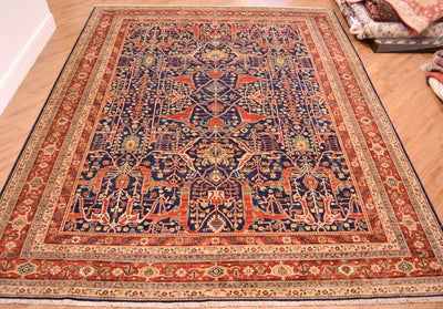 Overall image of Garous Design with ornate field and red, blue and gold detailing.