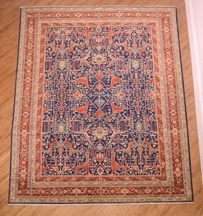  Deep blue ground all over geometric patterned handmade carpet from Afghanistan of Persian Garous design. Distinctive design with multiple network of vines and geometricised flowers. Rich colours of red, blue and gold with cloudband border with floral minor borders.